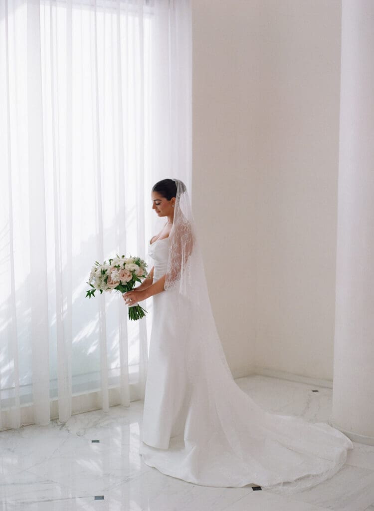 The Miami Beach Edition Wedding bridal portraits by window