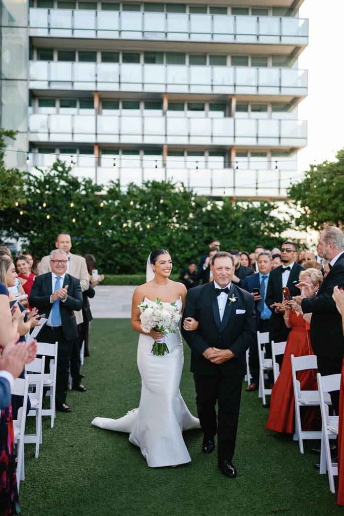 The Miami Beach Edition Wedding ceremony bride walking down