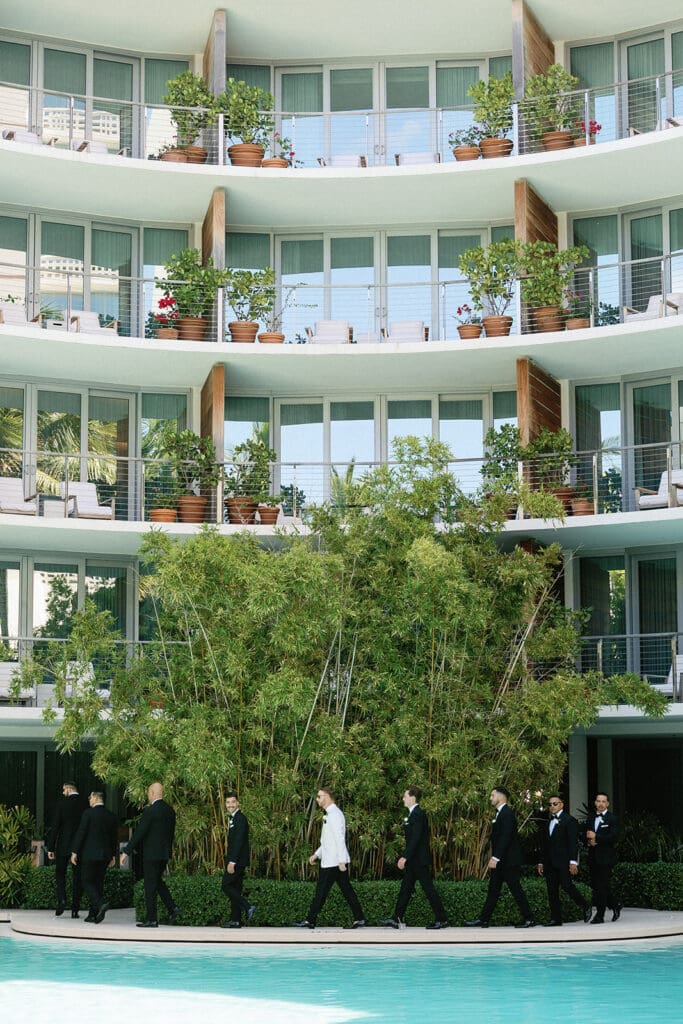 The Miami Beach Edition Wedding party portraits by pool
