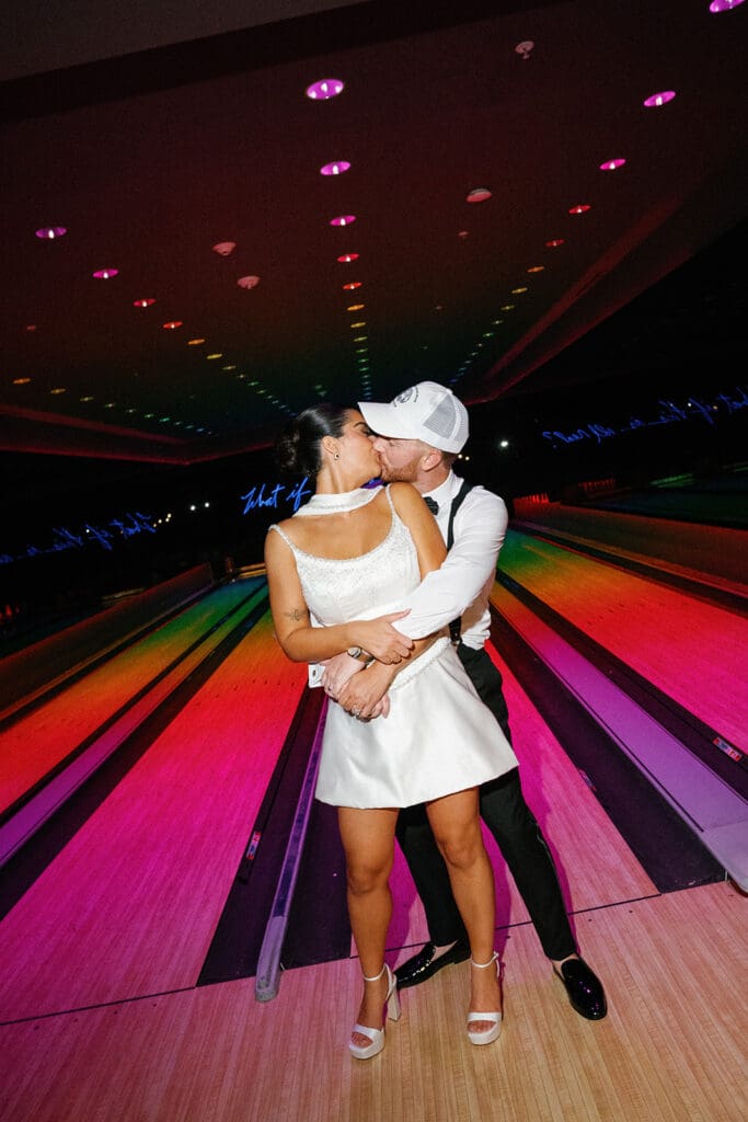 couple kissing at basement bowl